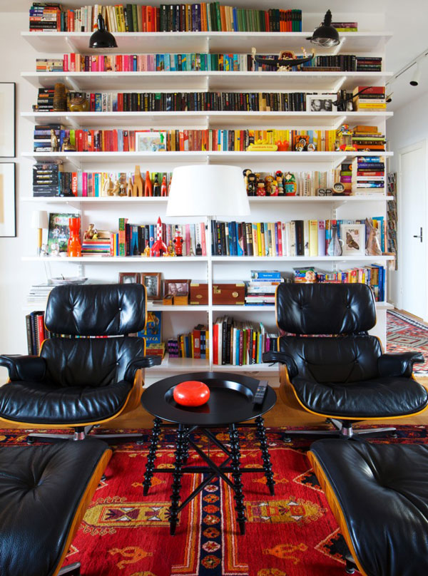 Eames-lounge-chairs-and-colorful-bookshelf-display-760x1024